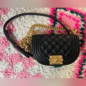 Mini/small boy bag. Black caviar quilted.